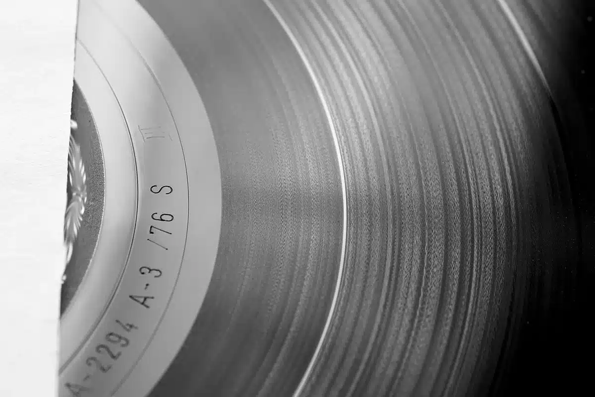 Limited-run vinyl records and merch on a table for superfans