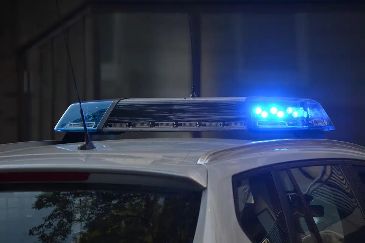 Police tape and officers near a closed public area