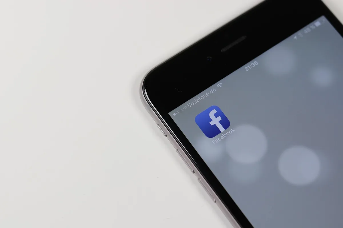 Smartphone screen showing social media comments and shares