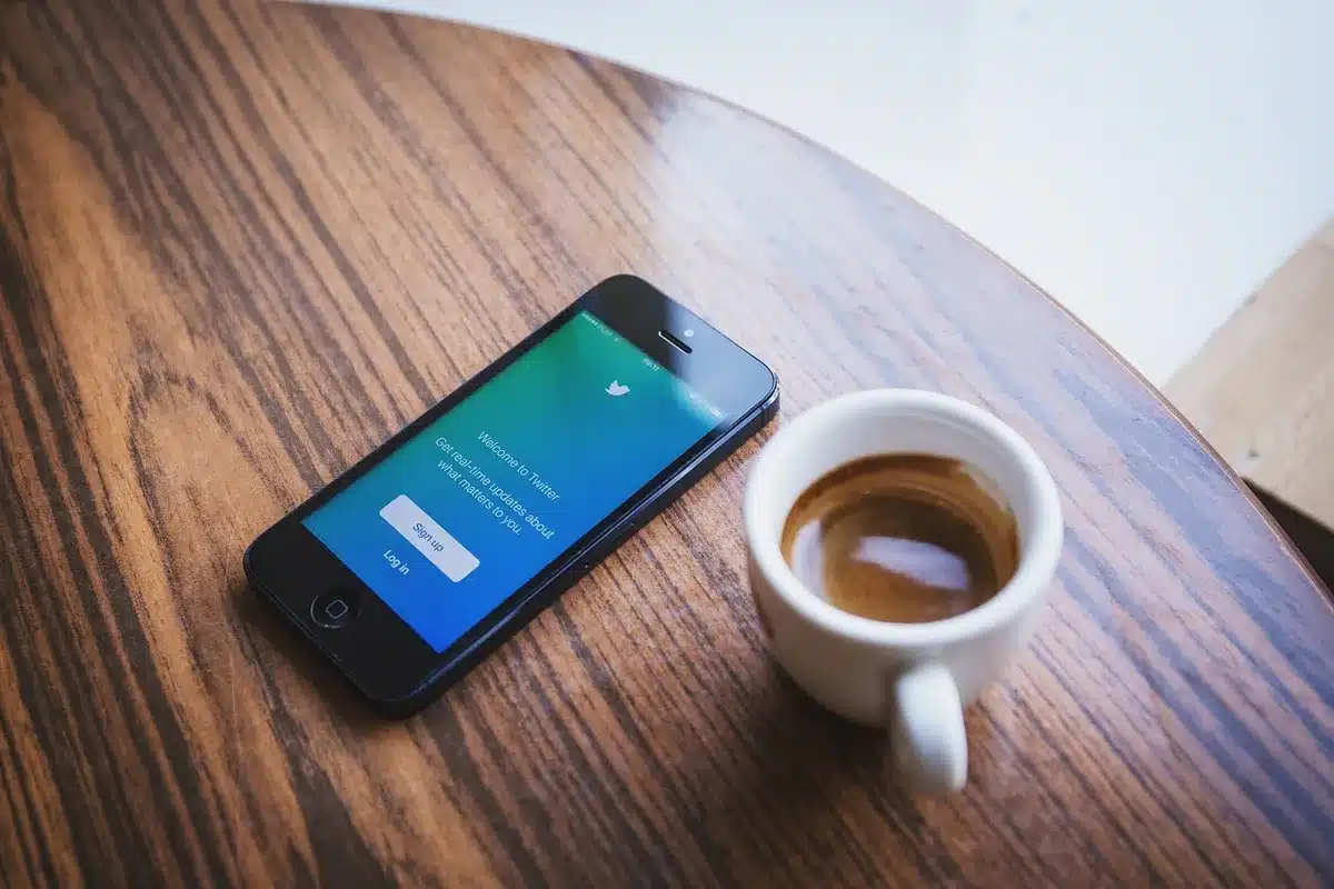 Smartphone showing a short video clip with social media reactions and notifications