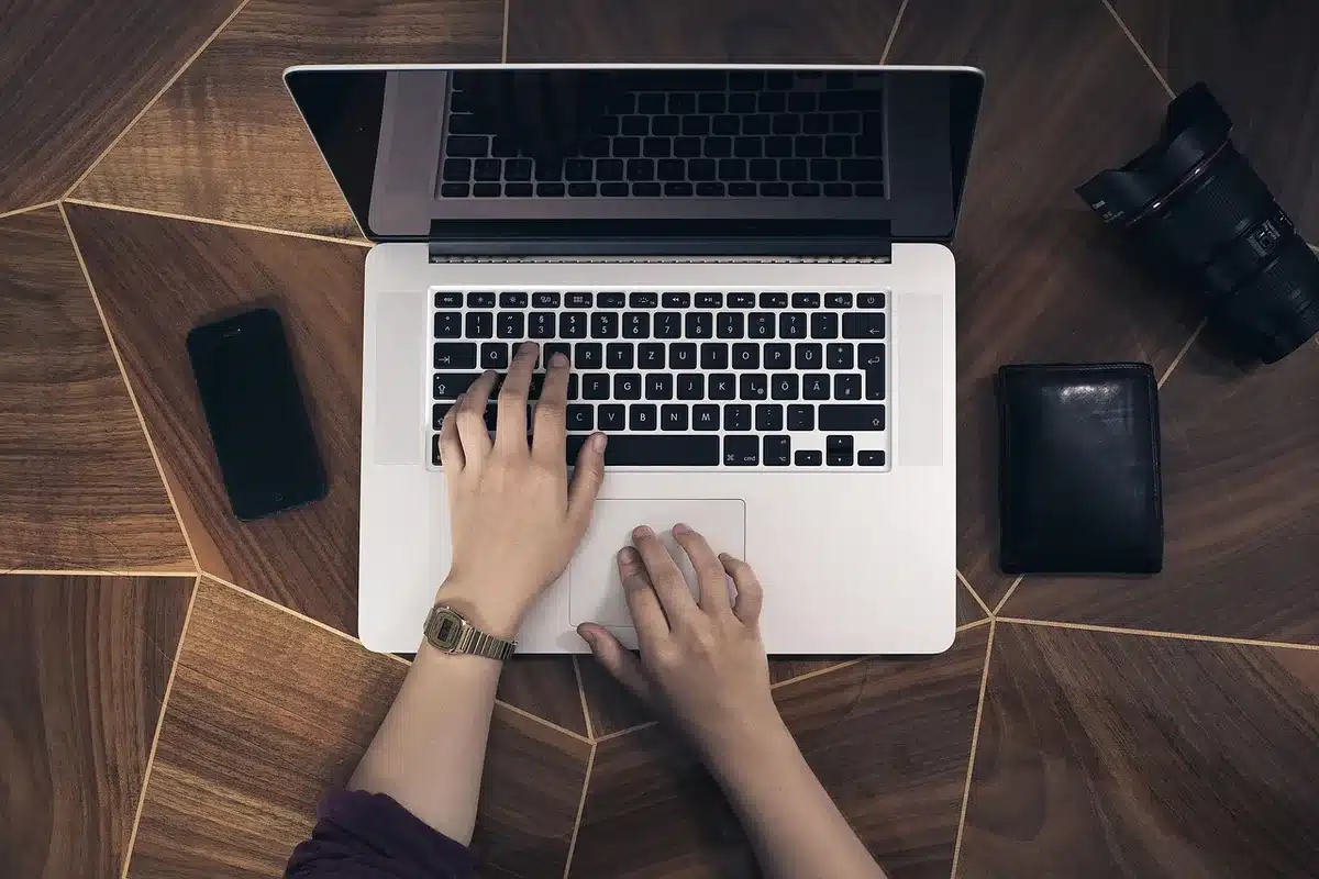 People looking at social media reactions about music on smartphones