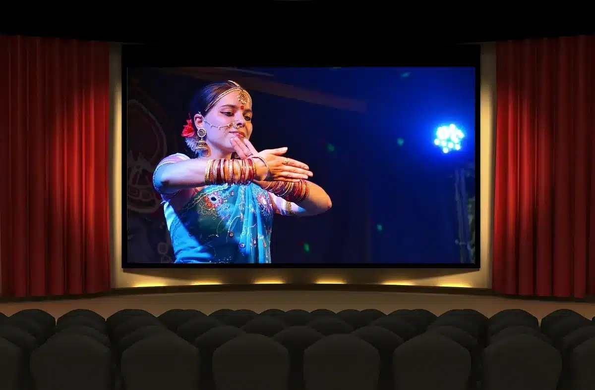 Theatrical stage costume and props on a dimly lit set