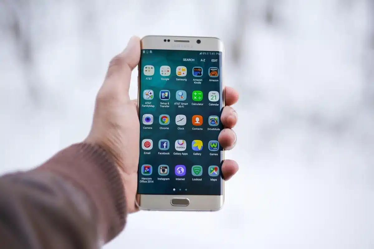 Close-up of a phone showing a short video message on a screen