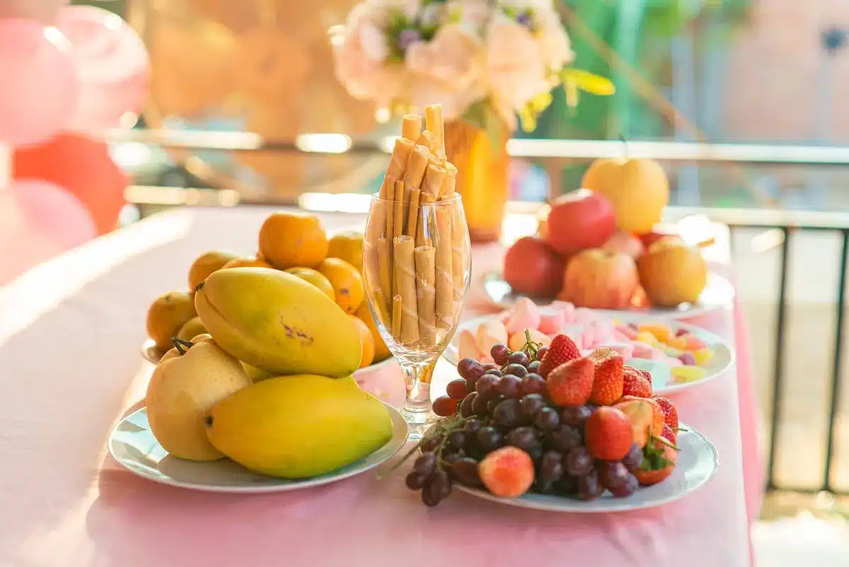 Close-up of formal place settings and polished silverware on a banquet table