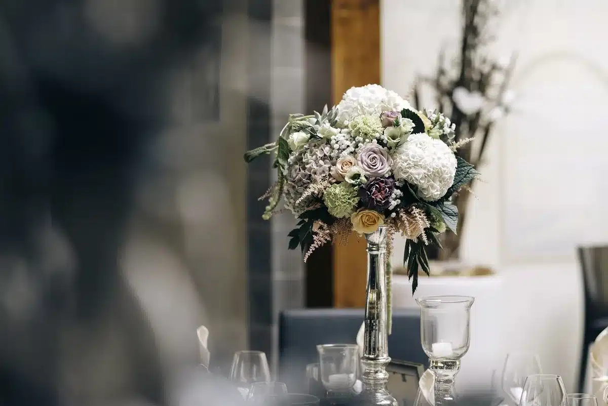 Close-up of an elegant state dinner table with silverware and centerpieces