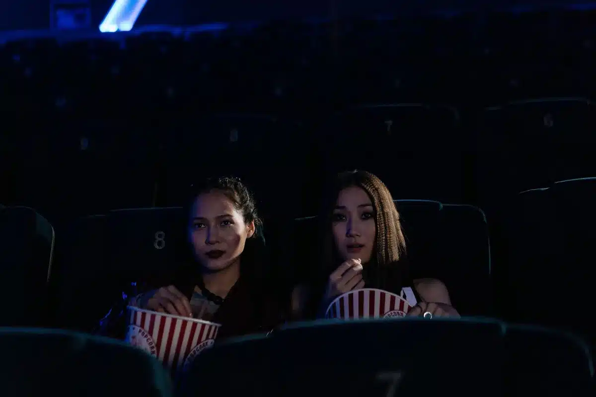 Audience in a film festival theater watching a screening