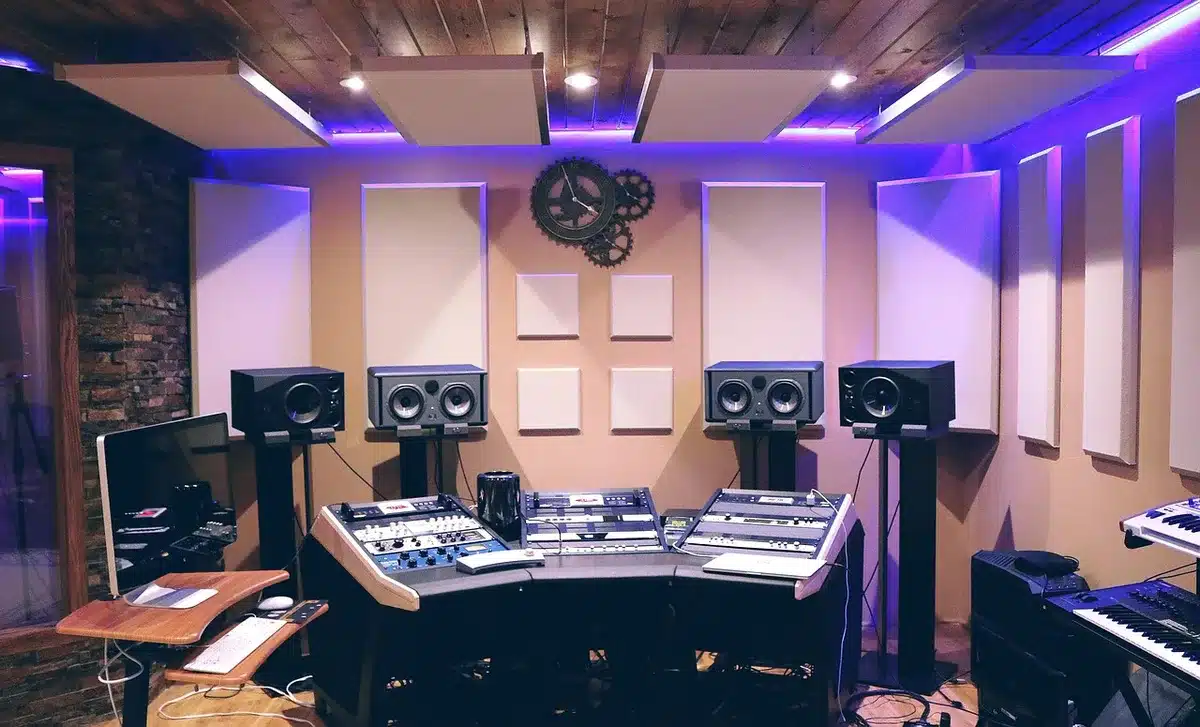 Generic television executive in a boardroom overlooking studio monitors