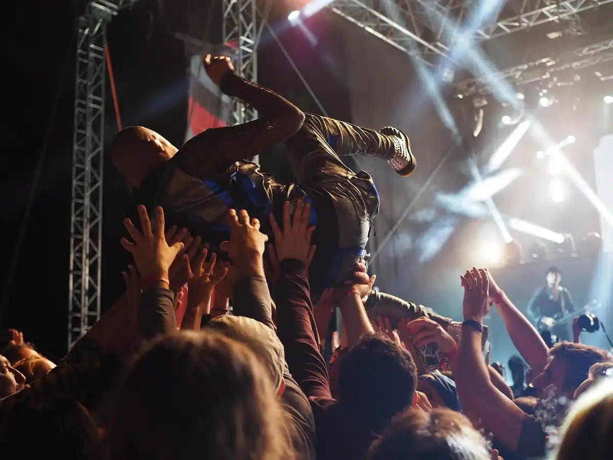 Empty late‑night stage with audience seats and spotlight
