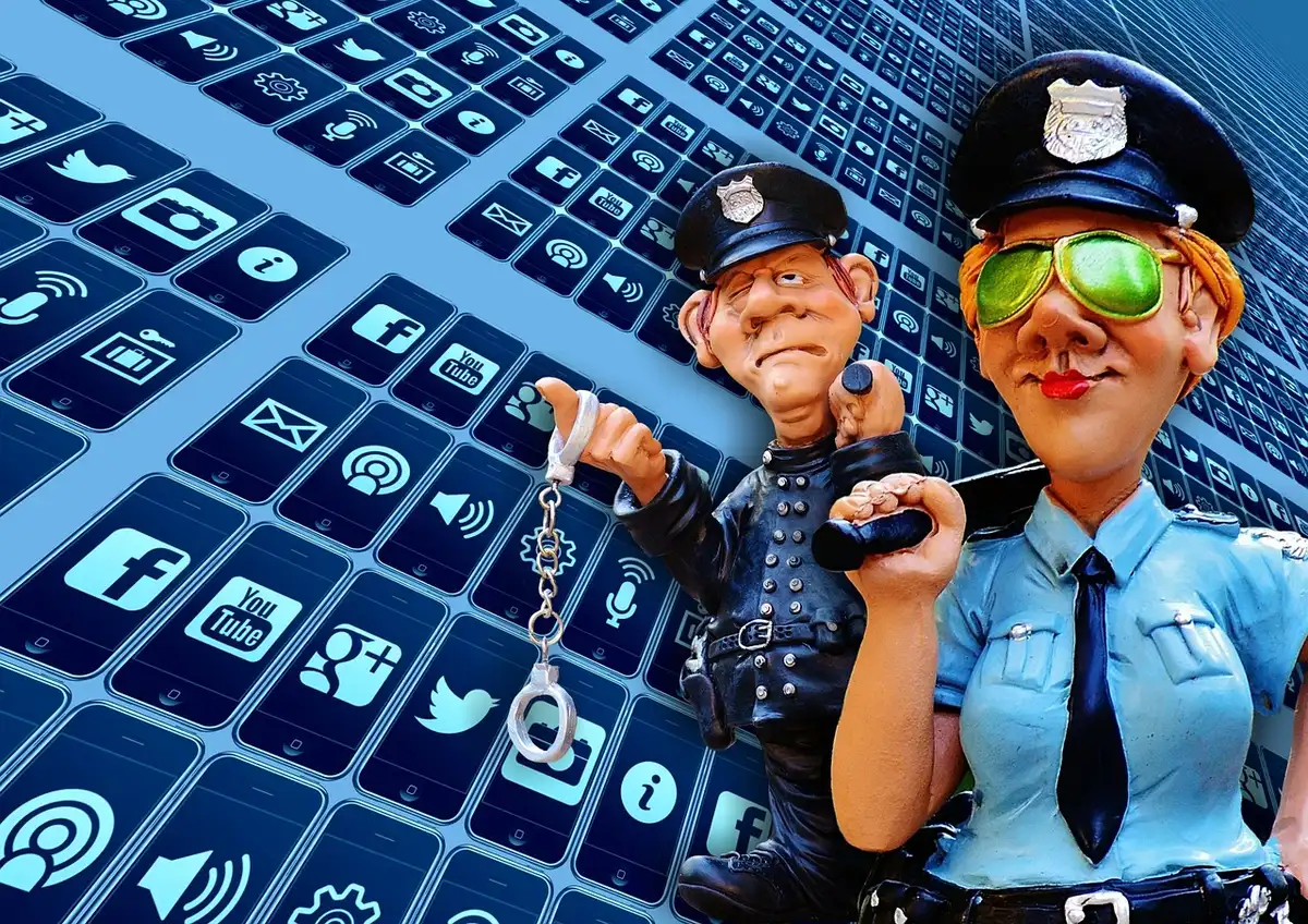 Phone screen showing social media clips and notifications, hands holding device