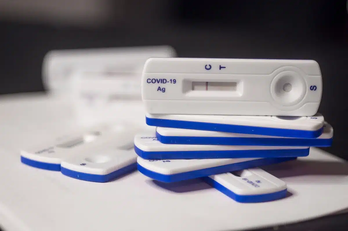 A home DNA test kit and sample tubes on a table